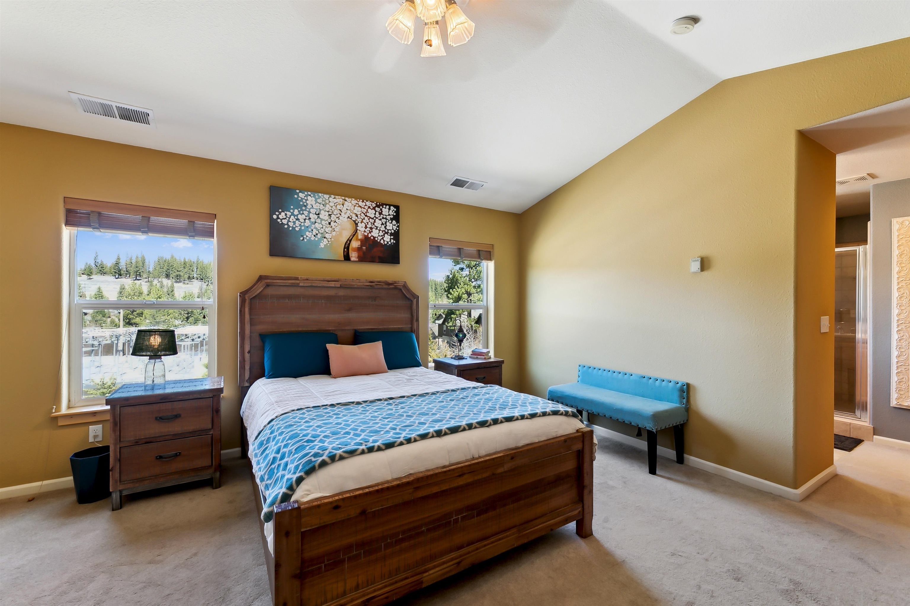 10096 Nicolas Drive, Unit C Truckee, CA 96161 - Photo 13 of 22 a bedroom with a bed and a window