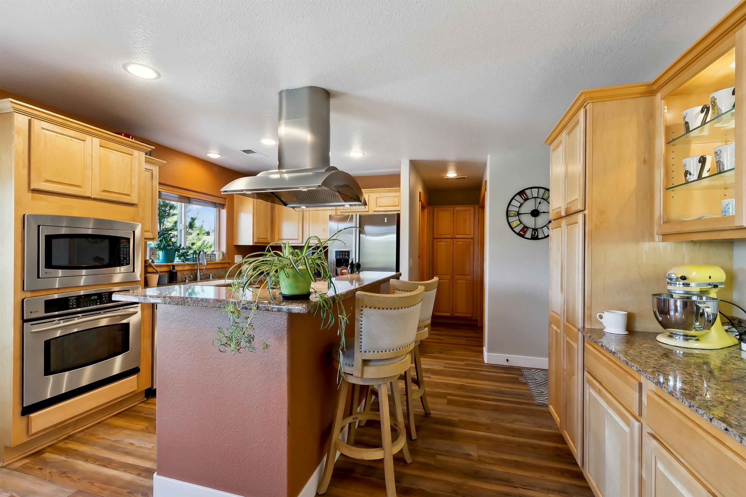 10096 Nicolas Drive, Unit C Truckee, CA 96161 - Photo 7 of 22 a kitchen with sink a microwave and cabinets