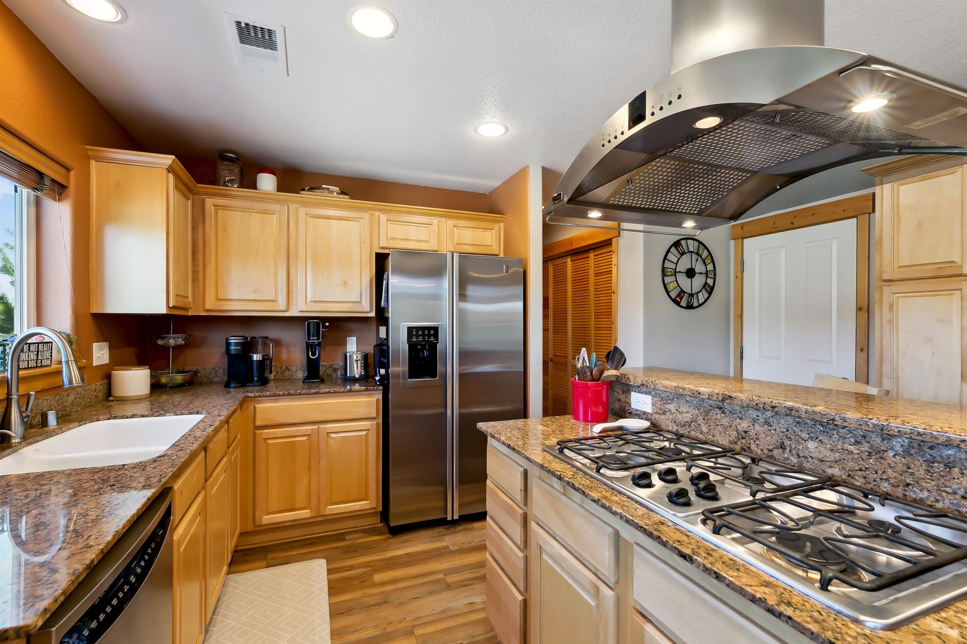 10096 Nicolas Drive, Unit C Truckee, CA 96161 - Photo 8 of 22 a kitchen with a stove a sink and a refrigerator
