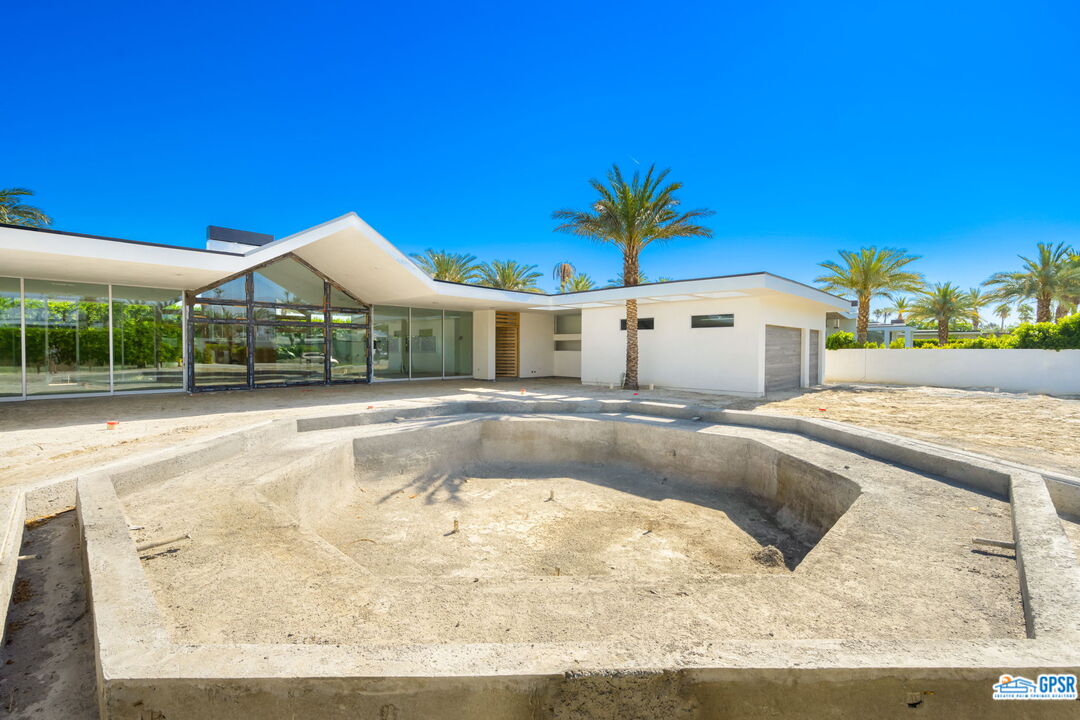 1 Makena Lane Rancho Mirage, CA 92270 - Photo 12 of 22 a view of a house with a swimming pool