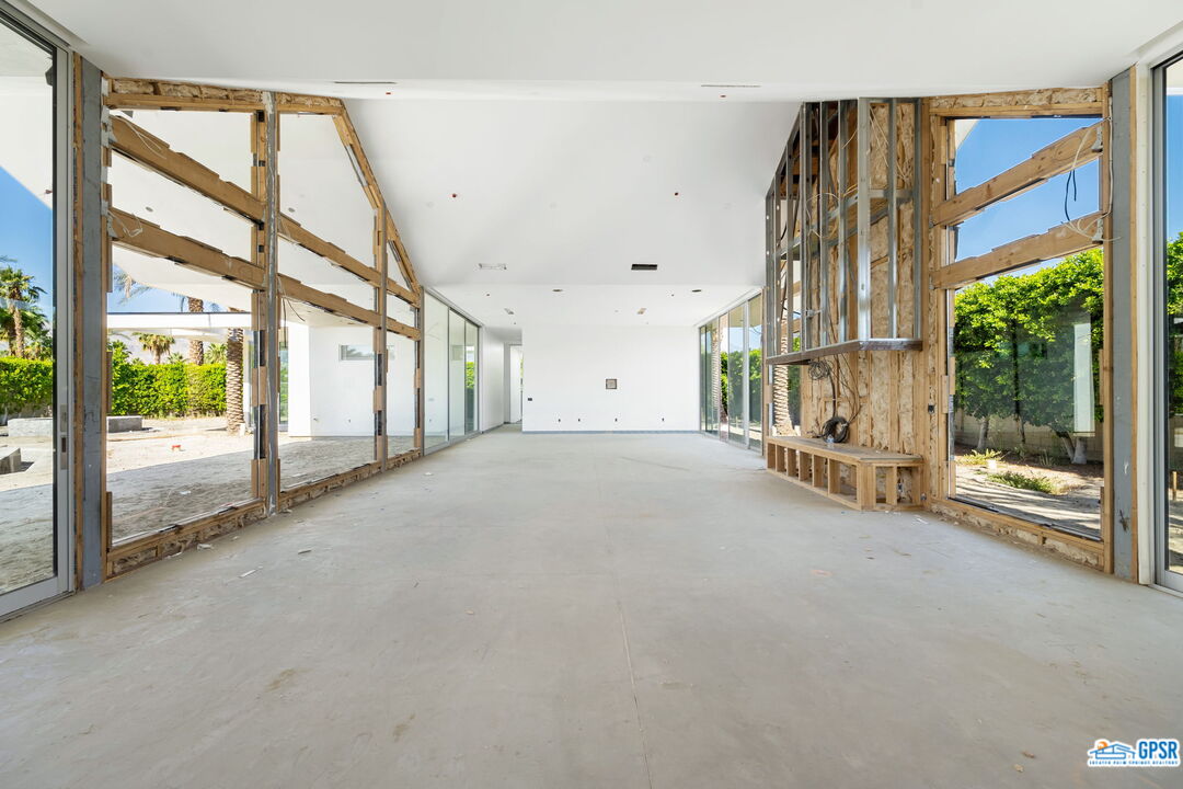 1 Makena Lane Rancho Mirage, CA 92270 - Photo 19 of 22 a view of an empty room with a floor to ceiling window