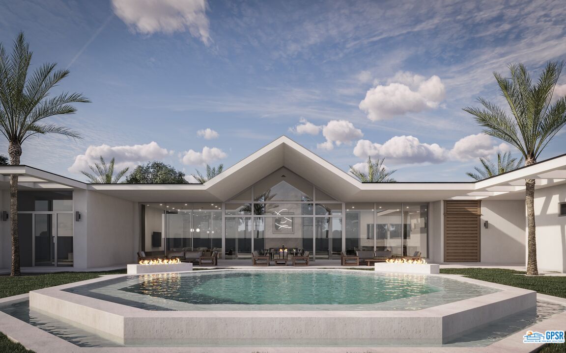 1 Makena Lane Rancho Mirage, CA 92270 - Photo 4 of 22 a view of a house with a swimming pool and furniture