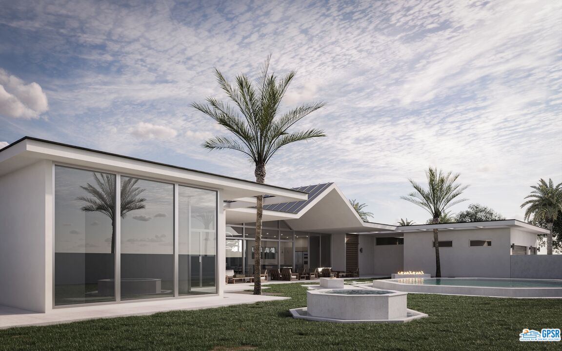 1 Makena Lane Rancho Mirage, CA 92270 - Photo 5 of 22 a front view of a house with garden