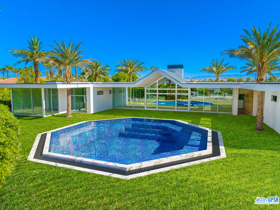 1 Makena Lane Rancho Mirage, CA 92270 - Photo 8 of 22 a view of outdoor space yard and swimming pool