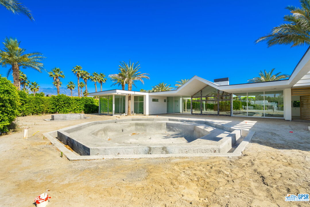 1 Makena Lane Rancho Mirage, CA 92270 - Photo 9 of 22 a view of house with outdoor space and sitting area