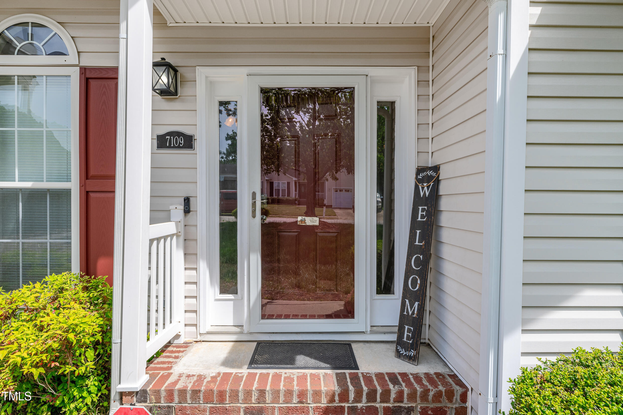 7109 Spanglers Spring Way Raleigh, NC 27610 - Photo 3 of 10 a view of balcony door
