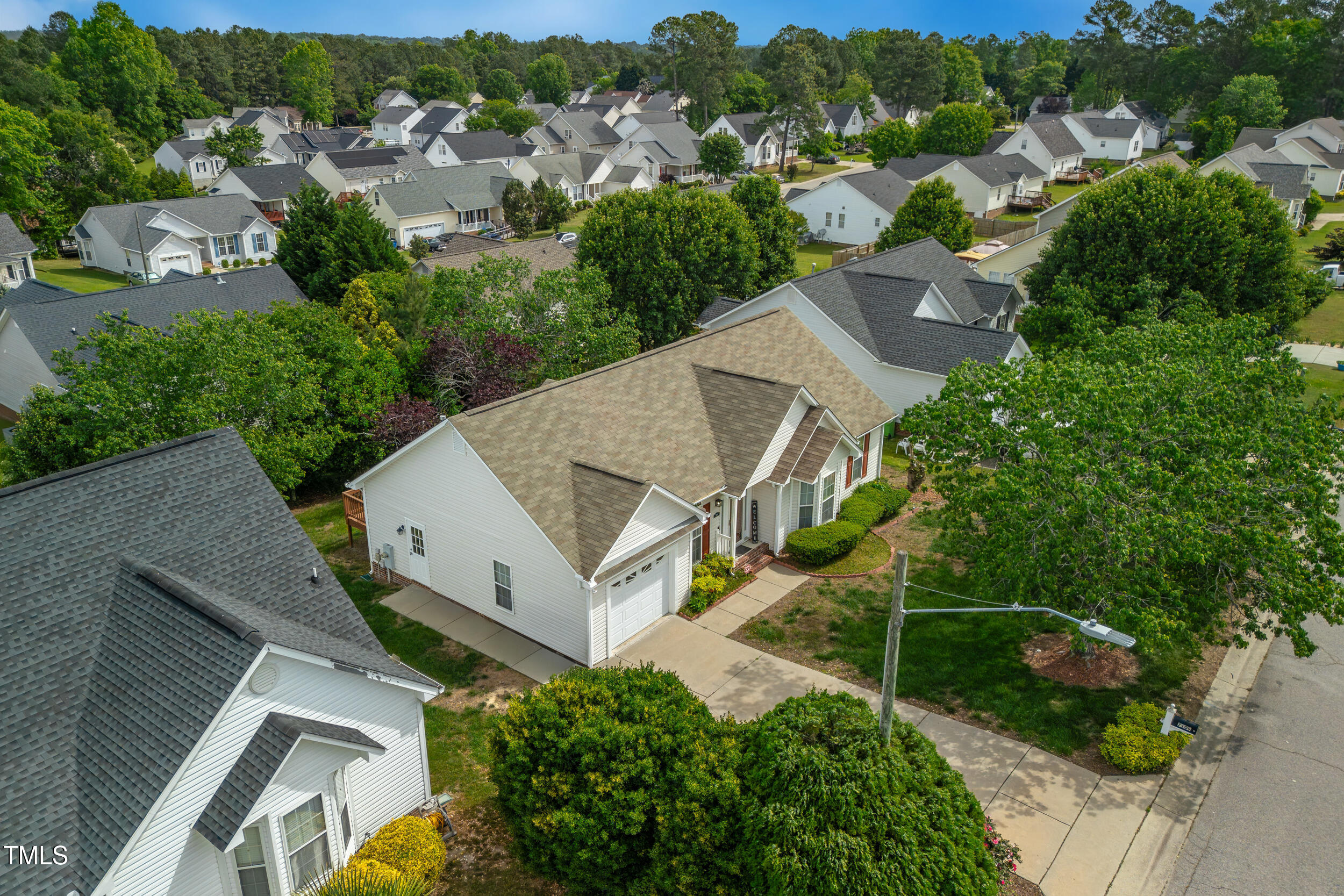 7109 Spanglers Spring Way Raleigh, NC 27610 - Photo 6 of 10 an aerial view of a house