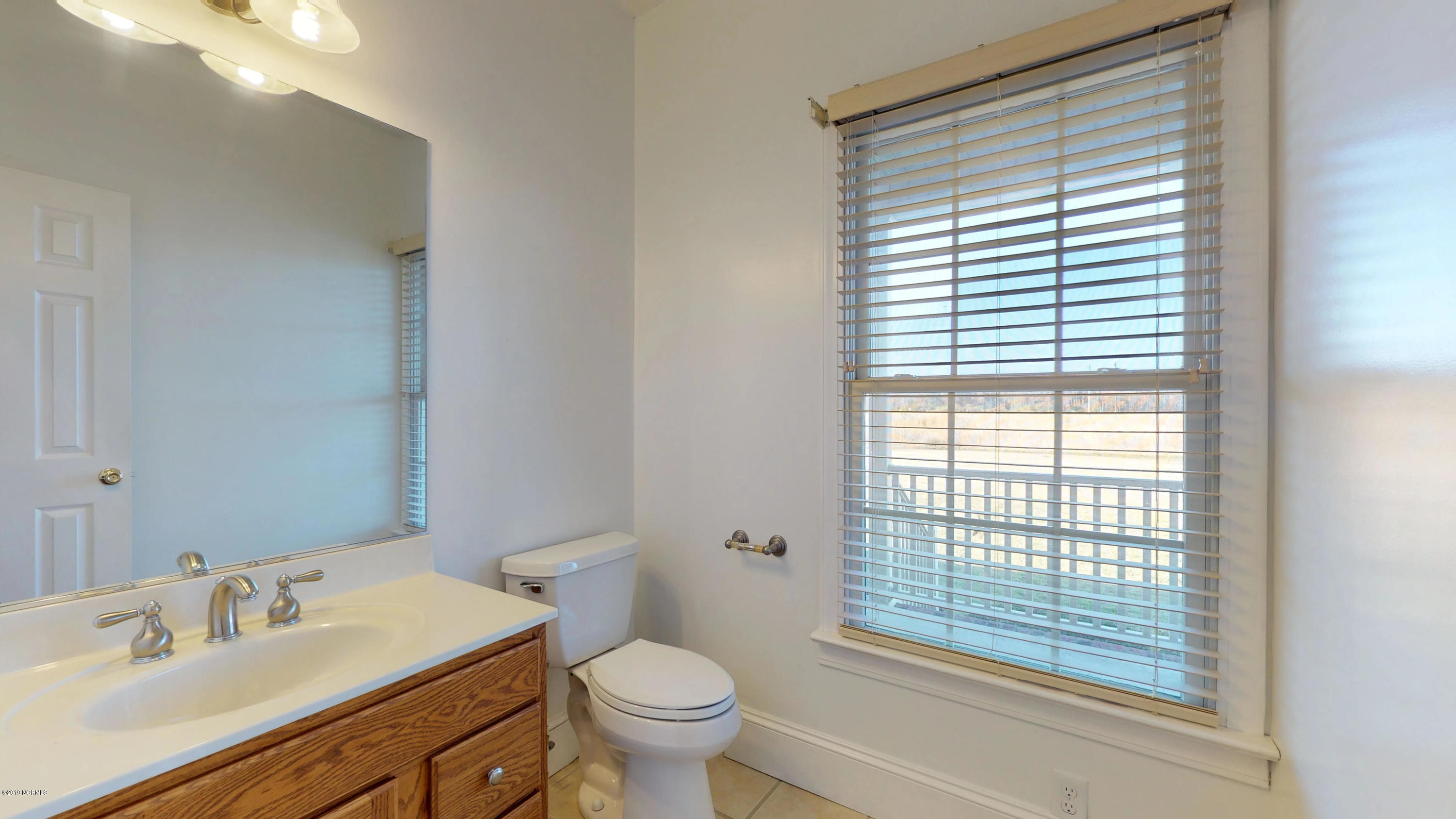 4768 Toddy Road Farmville, NC 27828 - Photo 56 of 68 Half bath on first floor