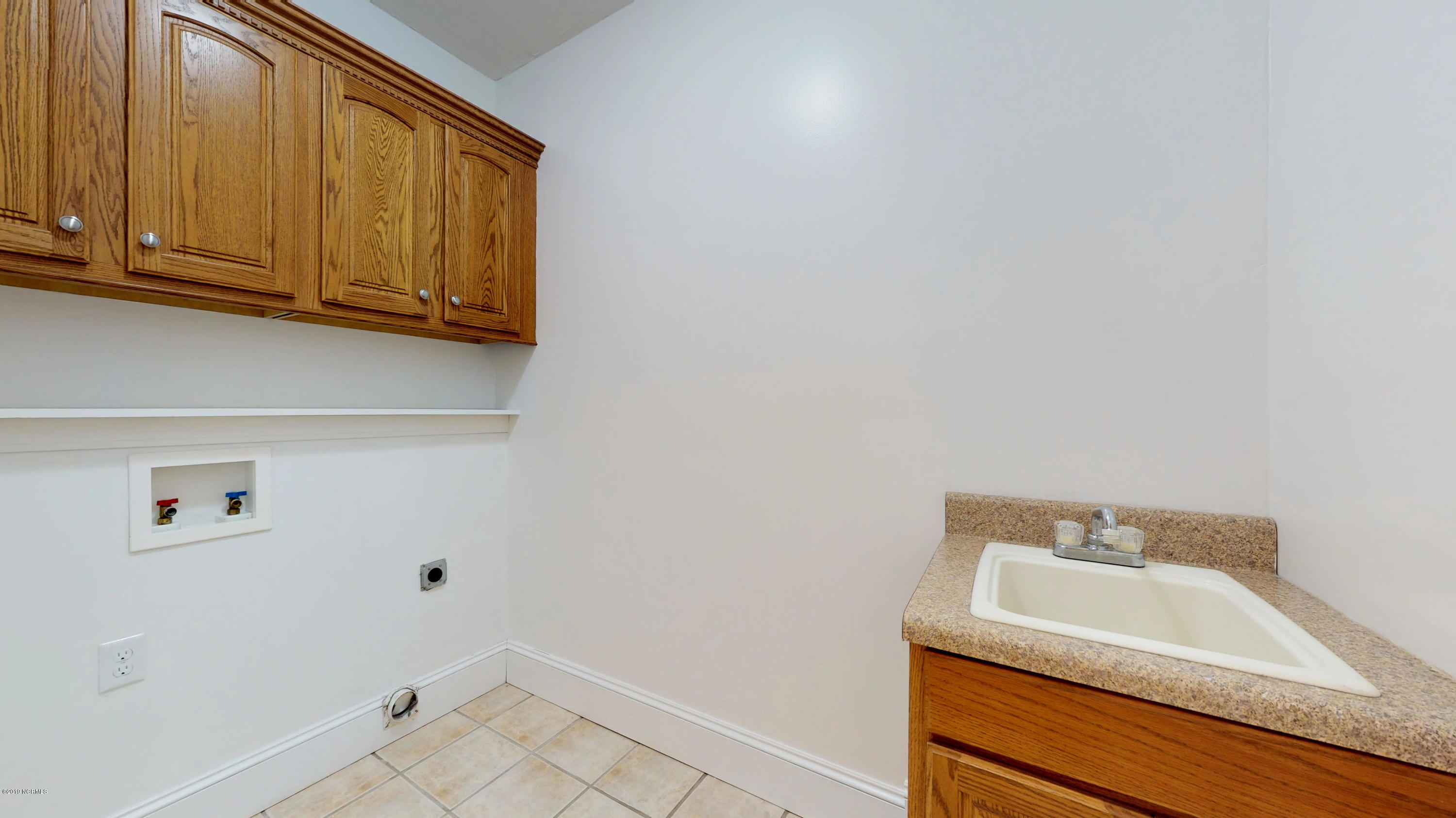4768 Toddy Road Farmville, NC 27828 - Photo 59 of 68 Laundry room - with sink & cabinets