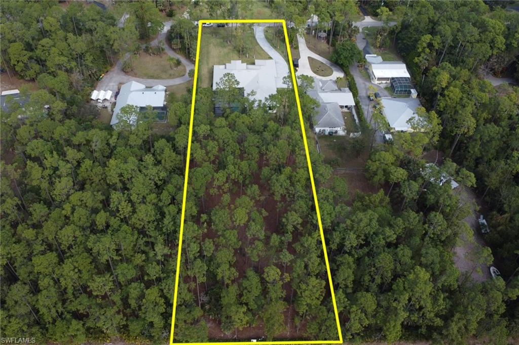 5174 Sycamore Drive Naples, FL 34119 - Photo 45 of 50 a view of a yard