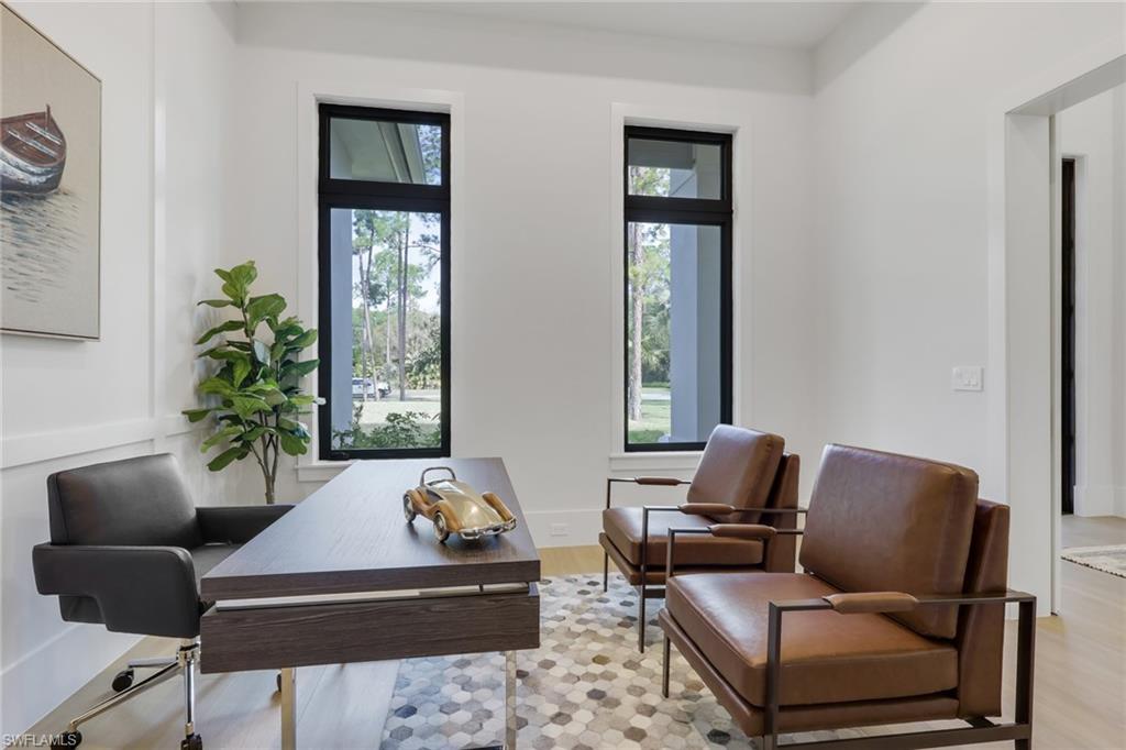 5174 Sycamore Drive Naples, FL 34119 - Photo 7 of 50 a living room with furniture