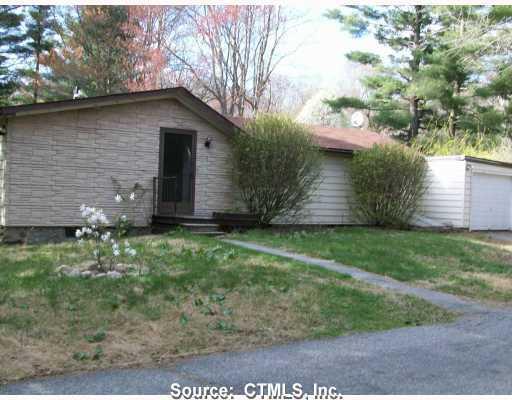41 Munson Road Wolcott, CT 06716 - Photo 1 of 1 a front view of a house with garden