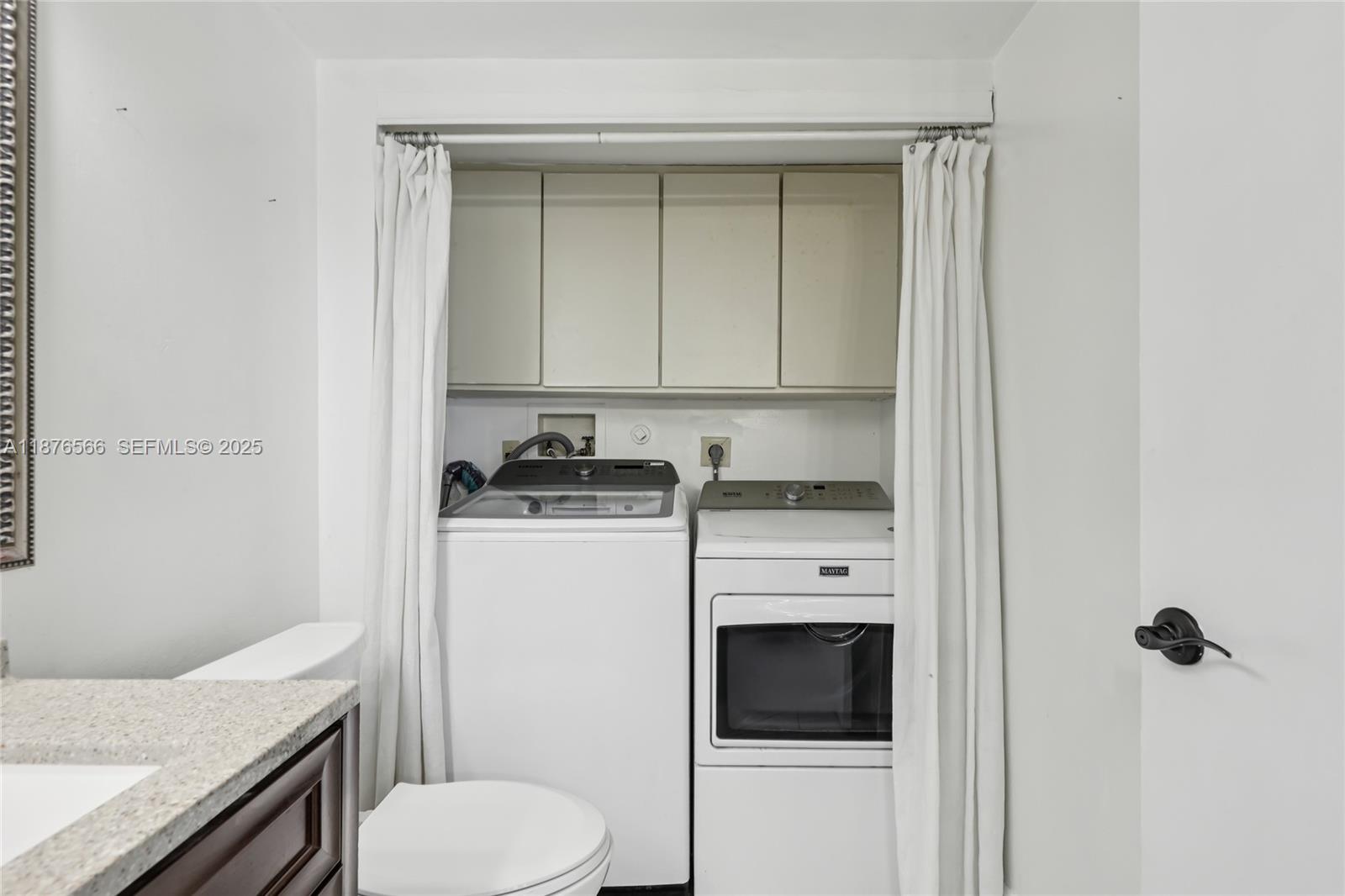 751 Southwest 120th Way Davie, FL 33325 - Photo 17 of 43 a bathroom with a granite countertop sink toilet and shower