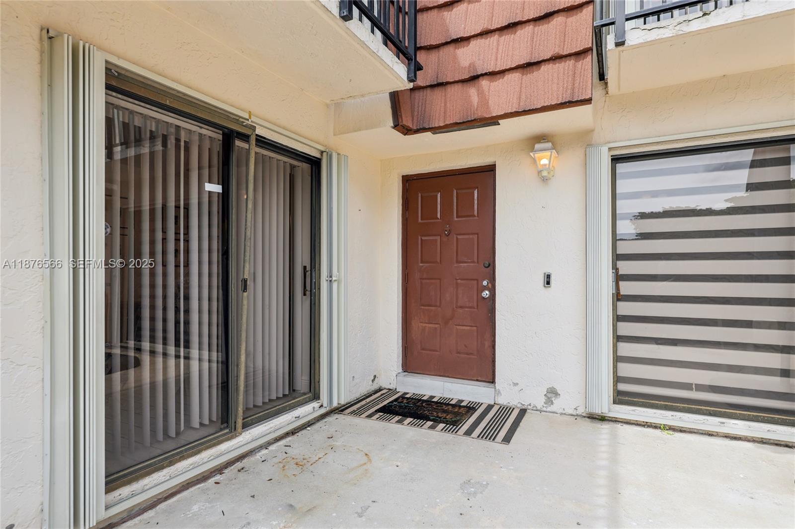 751 Southwest 120th Way Davie, FL 33325 - Photo 2 of 43 a view of a door and a window
