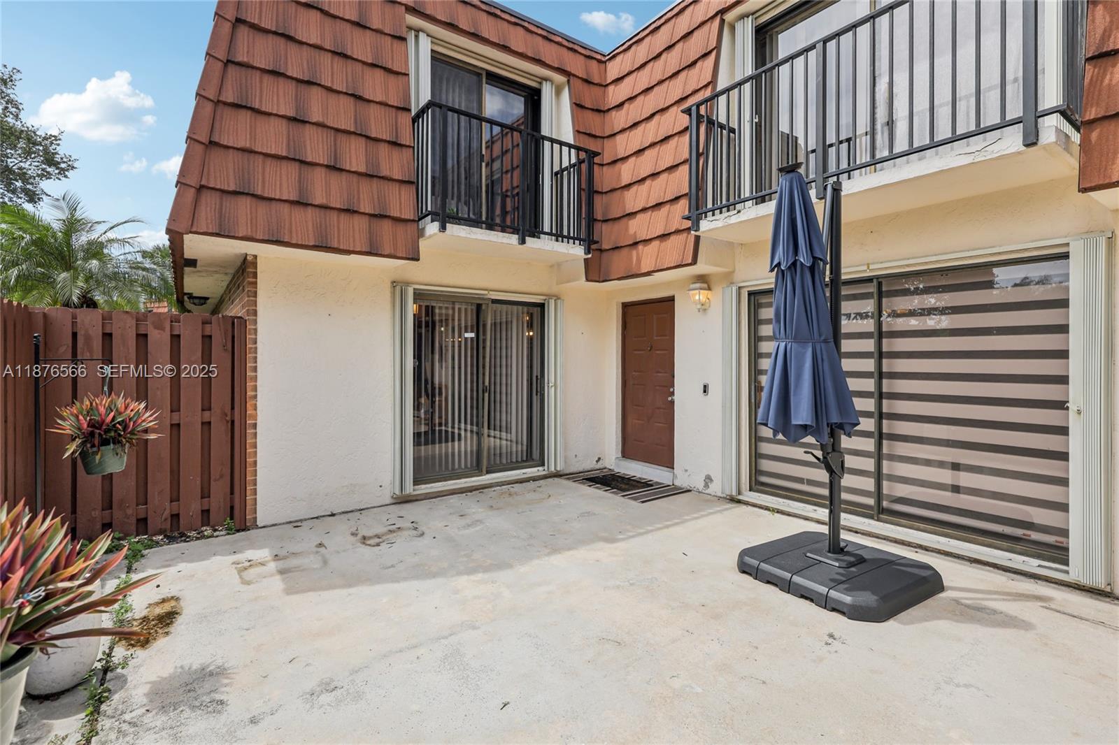 751 Southwest 120th Way Davie, FL 33325 - Photo 40 of 43 a front view of a house