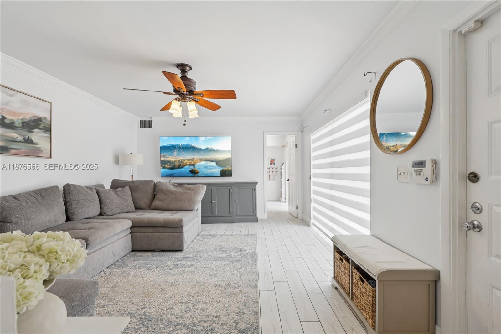 751 Southwest 120th Way Davie, FL 33325 - Photo 6 of 43 a living room with furniture and a large window