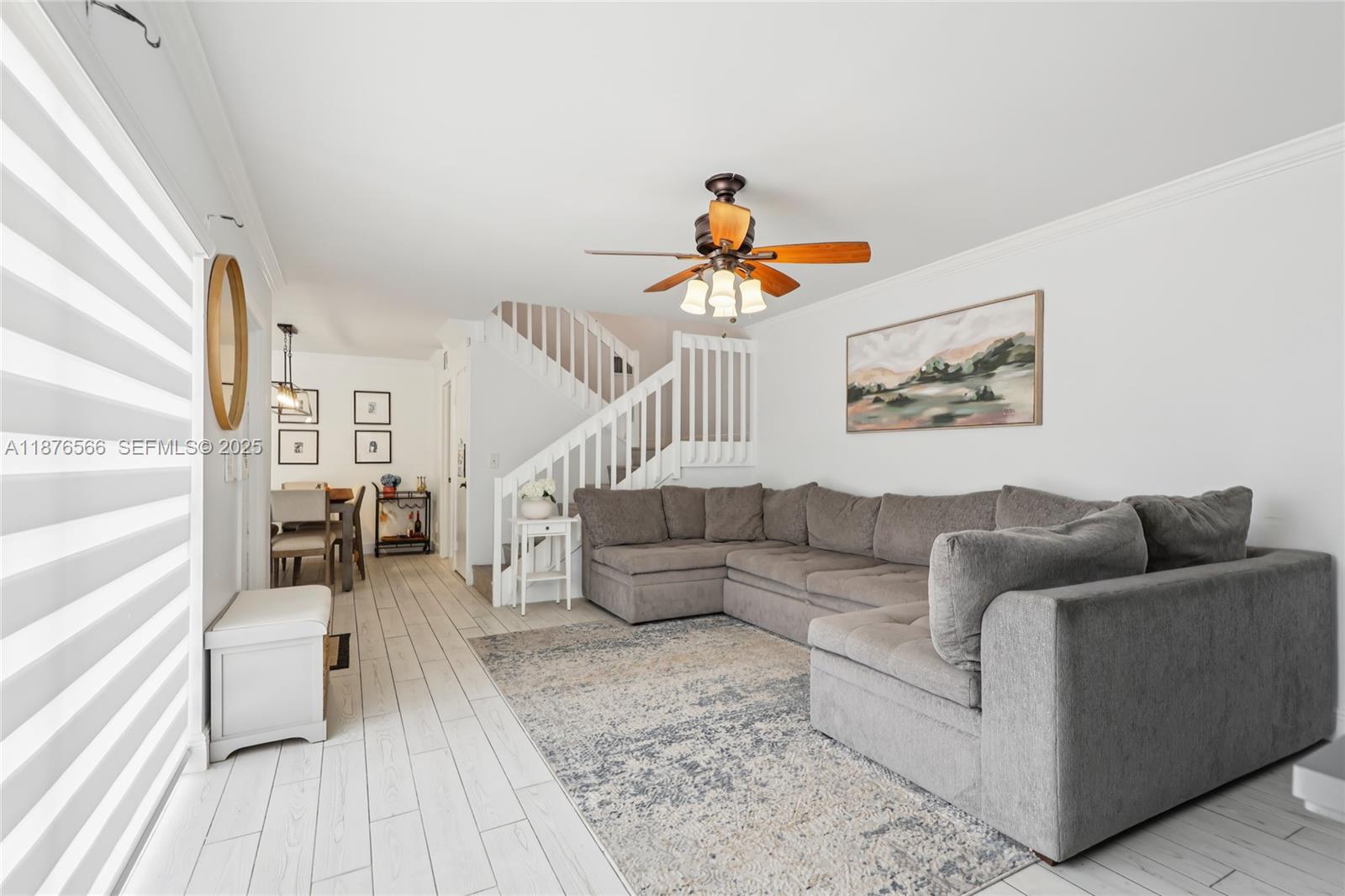 751 Southwest 120th Way Davie, FL 33325 - Photo 7 of 43 a living room with furniture and a fireplace