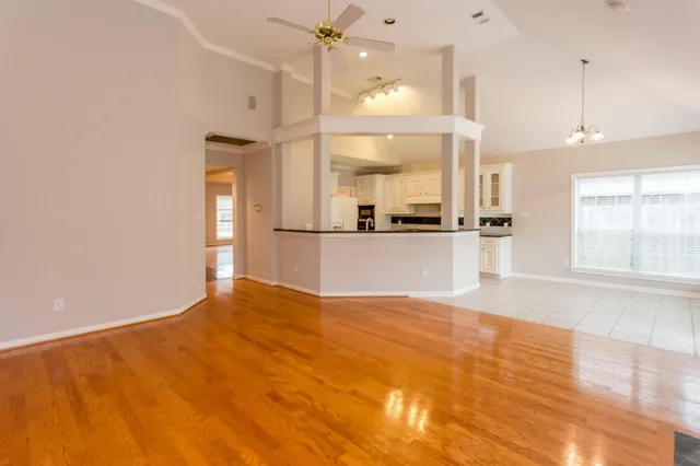 a view of a kitchen with a sink and cabinets