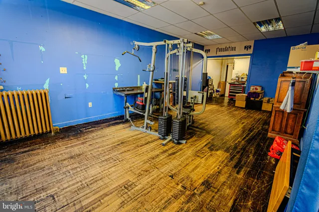 a room with furniture and wooden floor