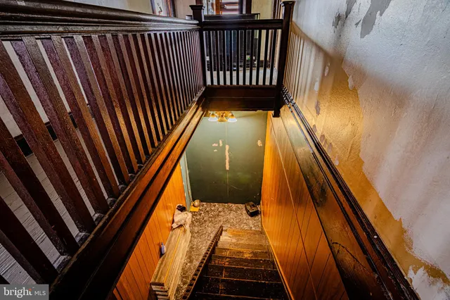 a view of a room with window and a rug