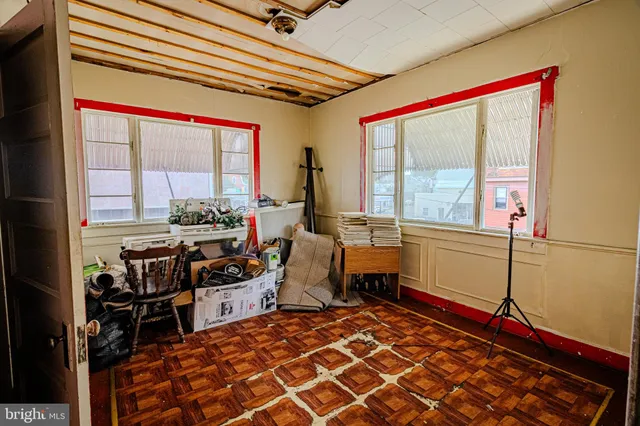 a utility room with multiple dryer and washer