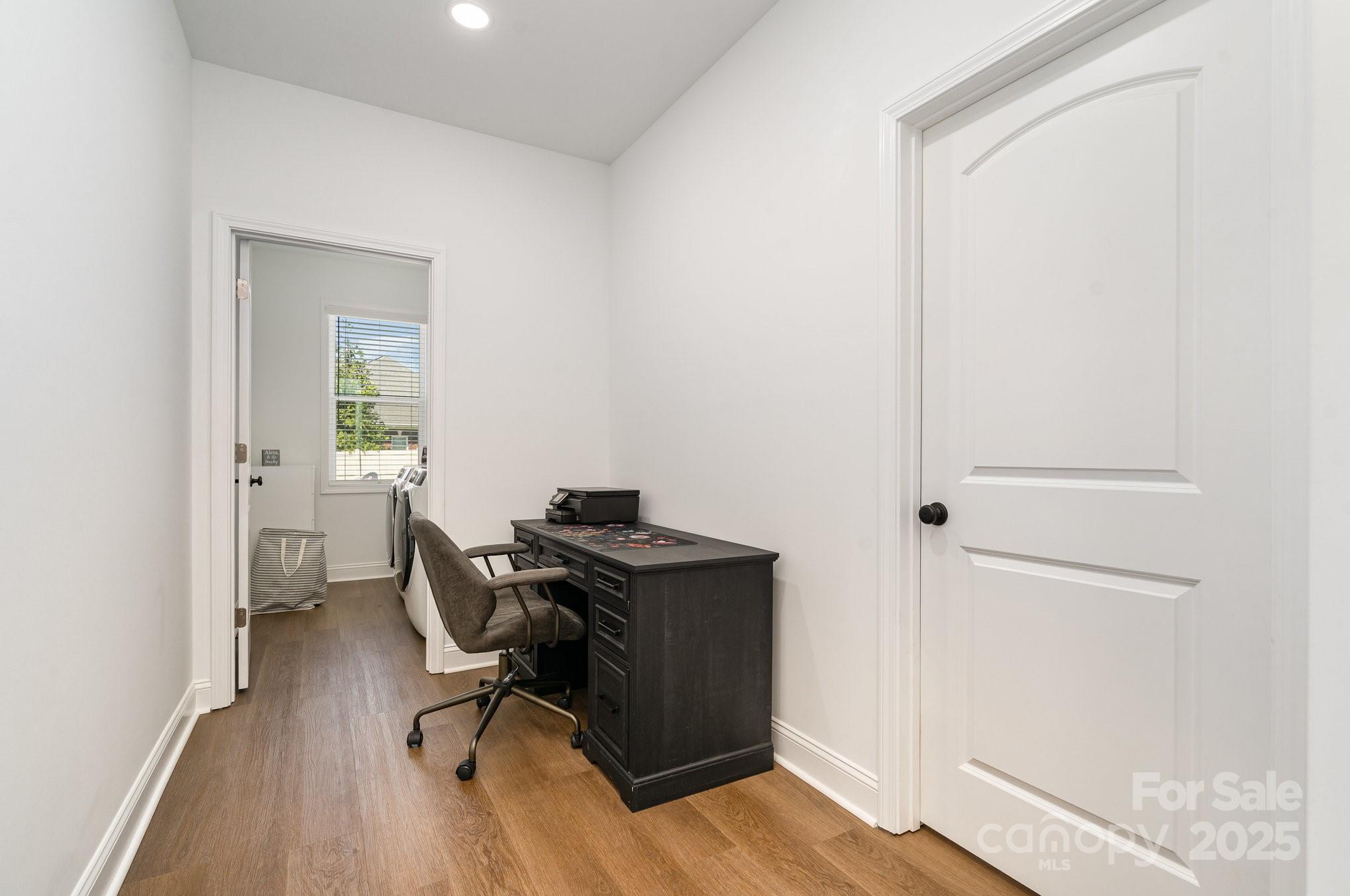 125 St Peters Church Road Gold Hill, NC 28071 - Photo 21 of 33 a view of a workspace with furniture and wooden floor