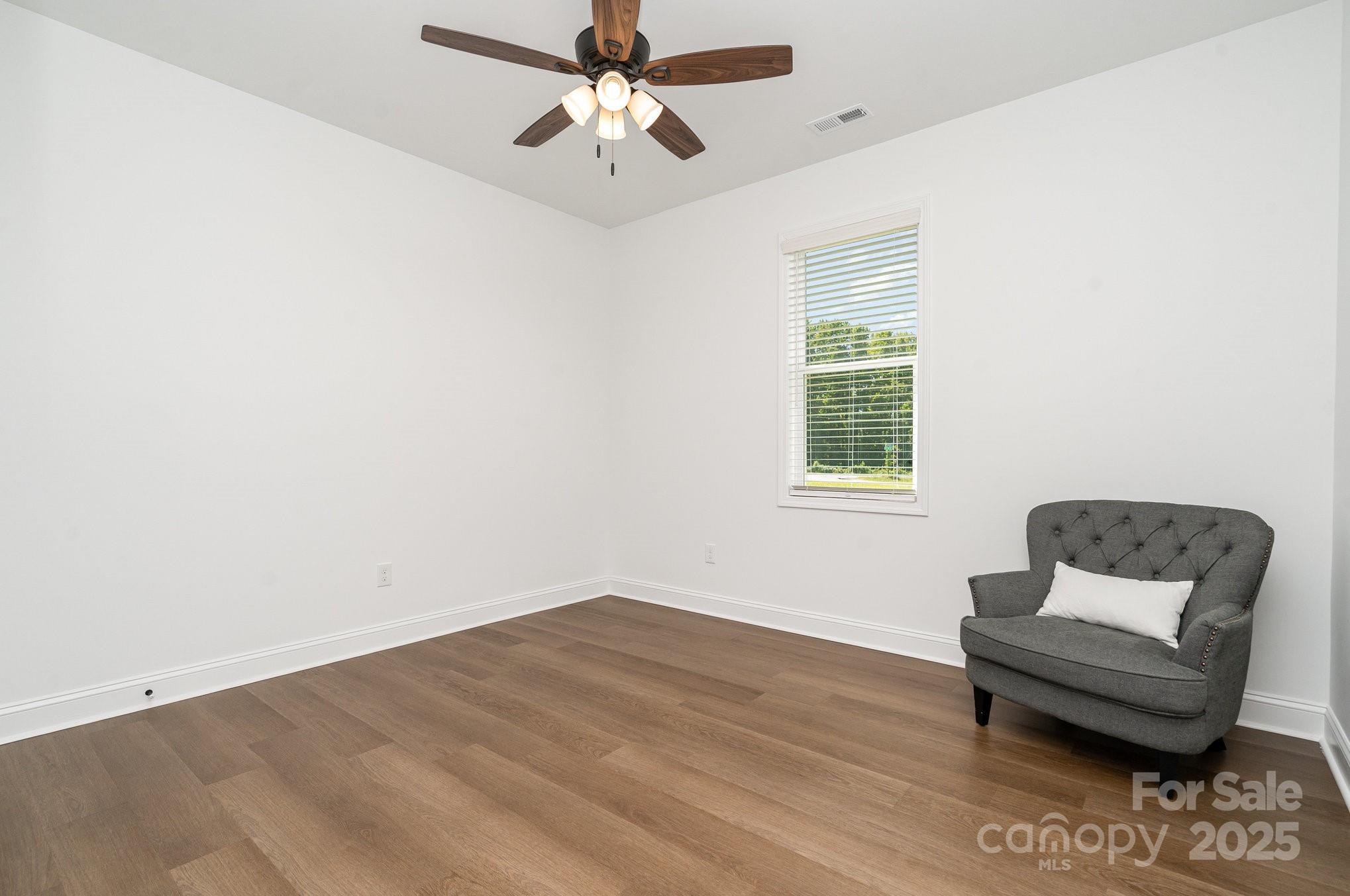 125 St Peters Church Road Gold Hill, NC 28071 - Photo 22 of 33 a living room with furniture and a window