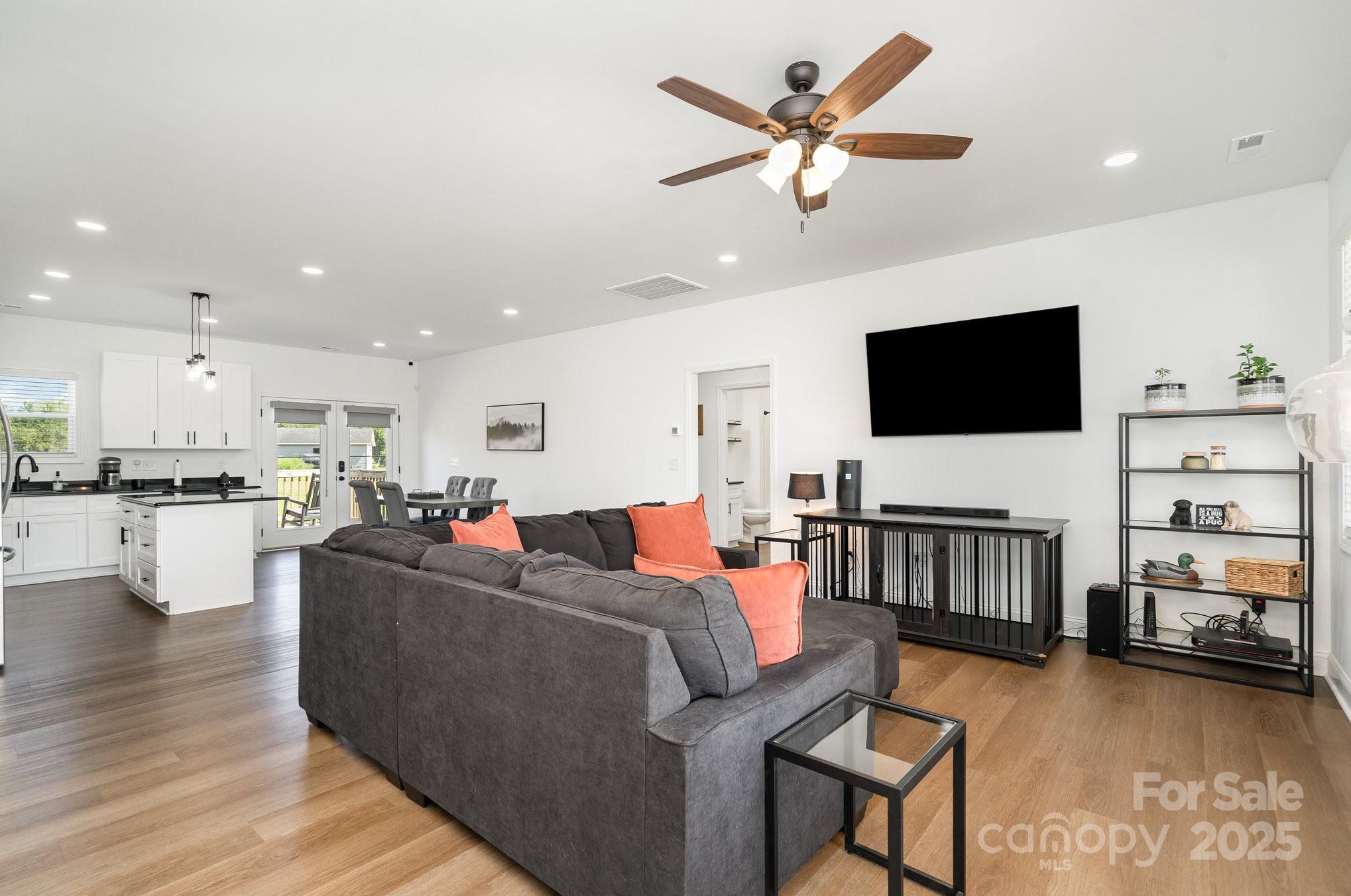 125 St Peters Church Road Gold Hill, NC 28071 - Photo 7 of 33 a living room with furniture and a flat screen tv