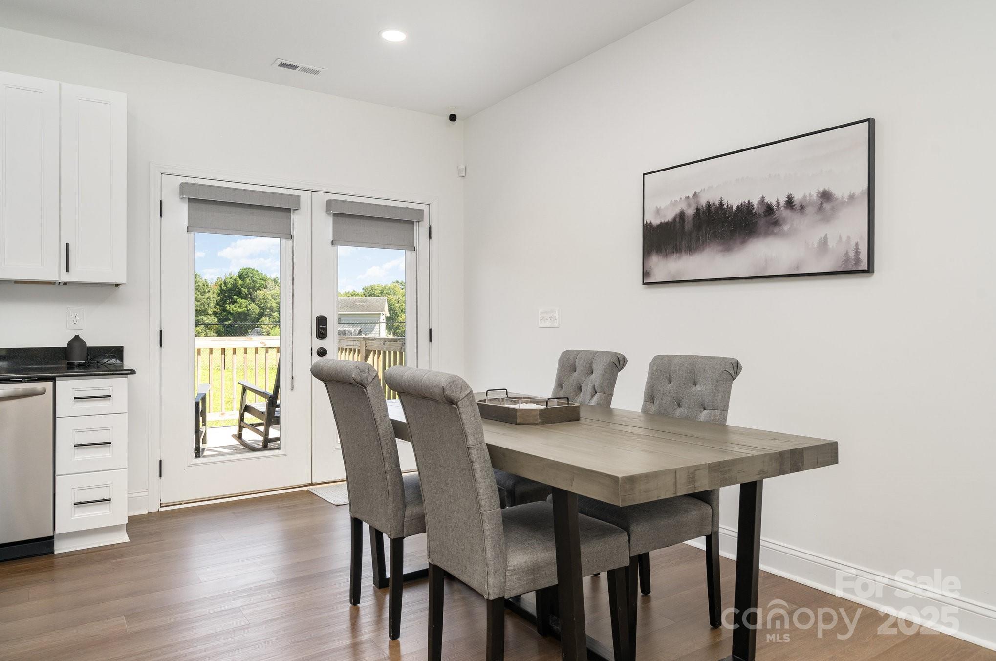 125 St Peters Church Road Gold Hill, NC 28071 - Photo 9 of 33 a view of a dining room with furniture window and wooden floor