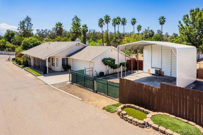 322 G Street Ramona, CA 92065 - Photo 2 of 61 an aerial view of a house with swimming pool and sitting area