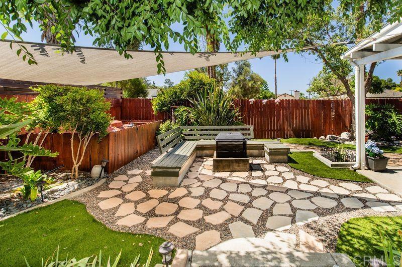 322 G Street Ramona, CA 92065 - Photo 35 of 61 a view of a backyard with wooden fence