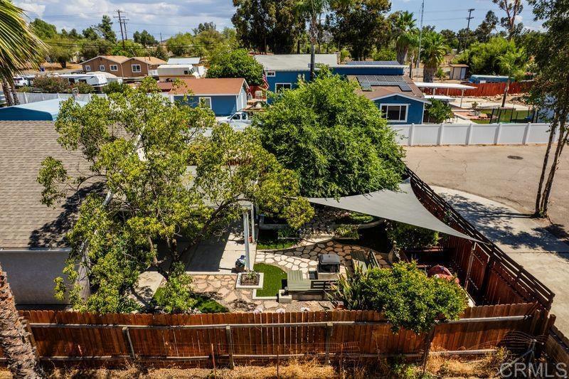322 G Street Ramona, CA 92065 - Photo 43 of 61 a view of a chairs and table in backyard