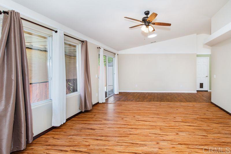 322 G Street Ramona, CA 92065 - Photo 9 of 61 wooden floor in an empty room with a window