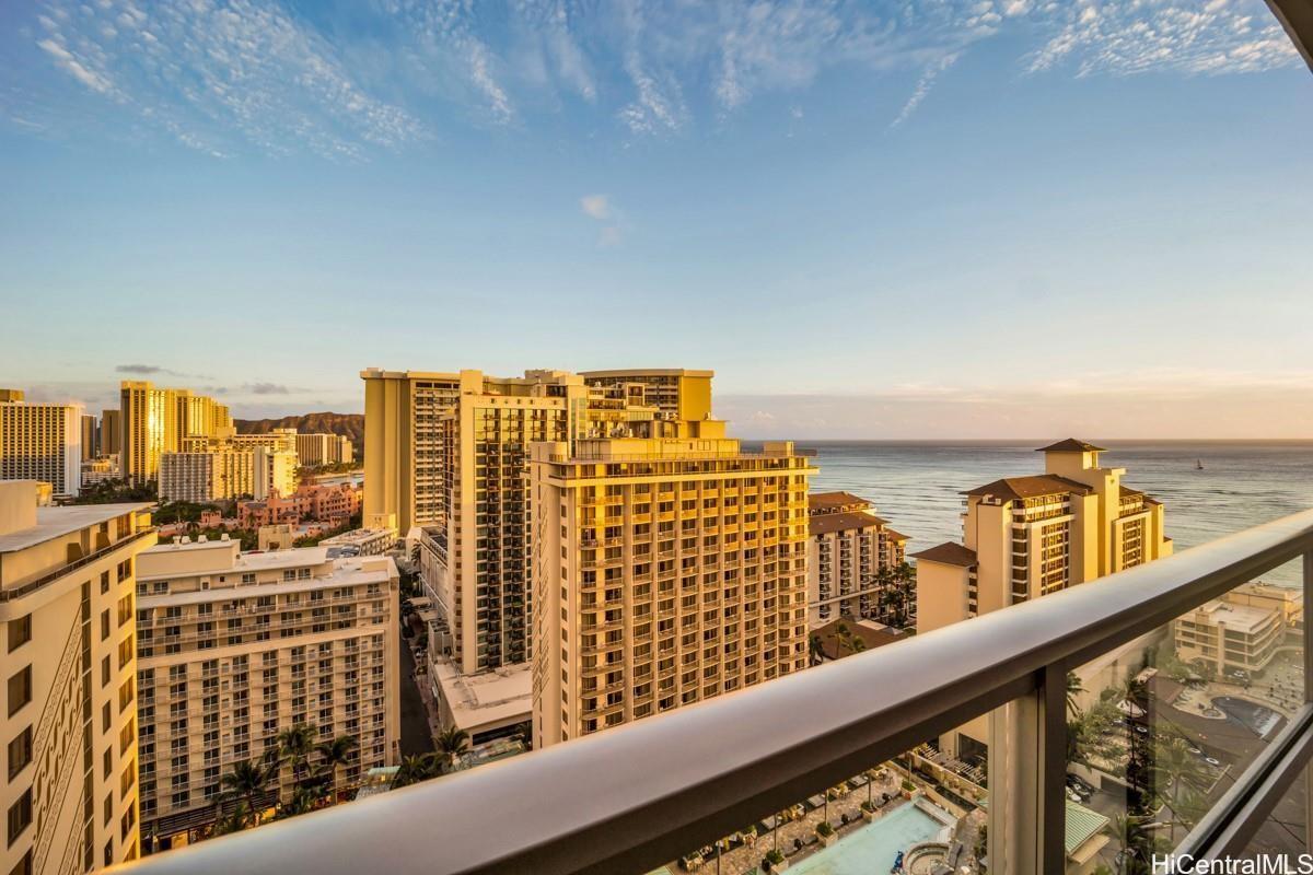 a view of a balcony with city view