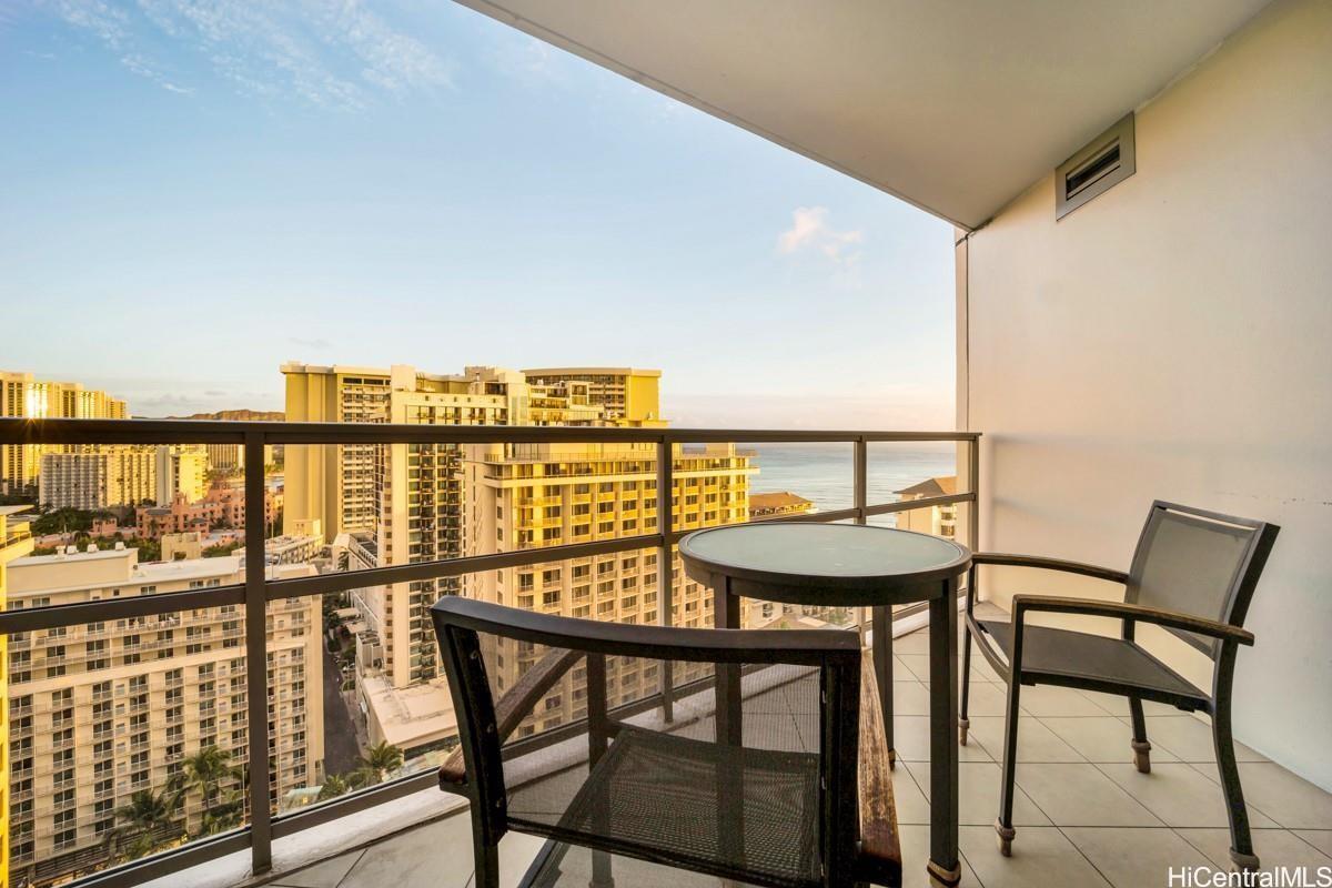 223 Saratoga Road, Unit 2006 Honolulu, HI 96815 - Photo 14 of 15 a view of a chairs and table in the balcony