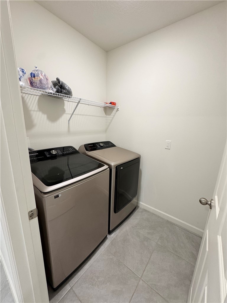 1836 Barber Street Sebastian, FL 32958 - Photo 28 of 29 a utility room with dryer and washer