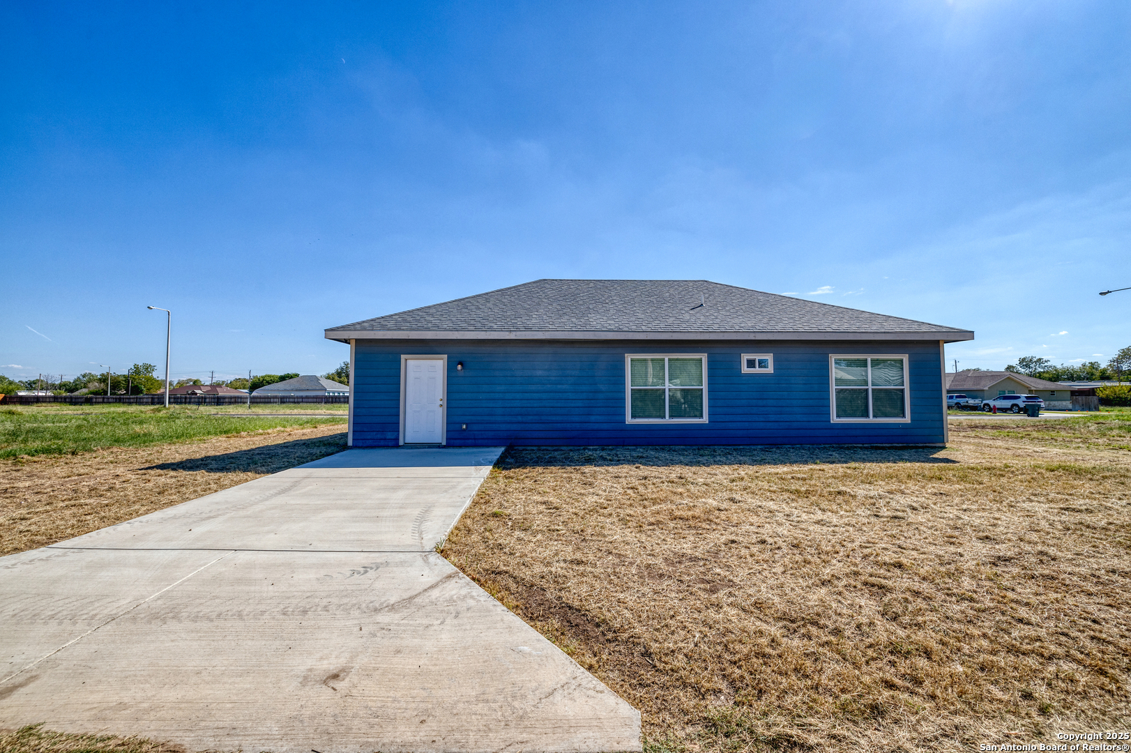 413 Guajillo Uvalde, TX 78801 - Photo 20 of 23 a view of a house with a yard