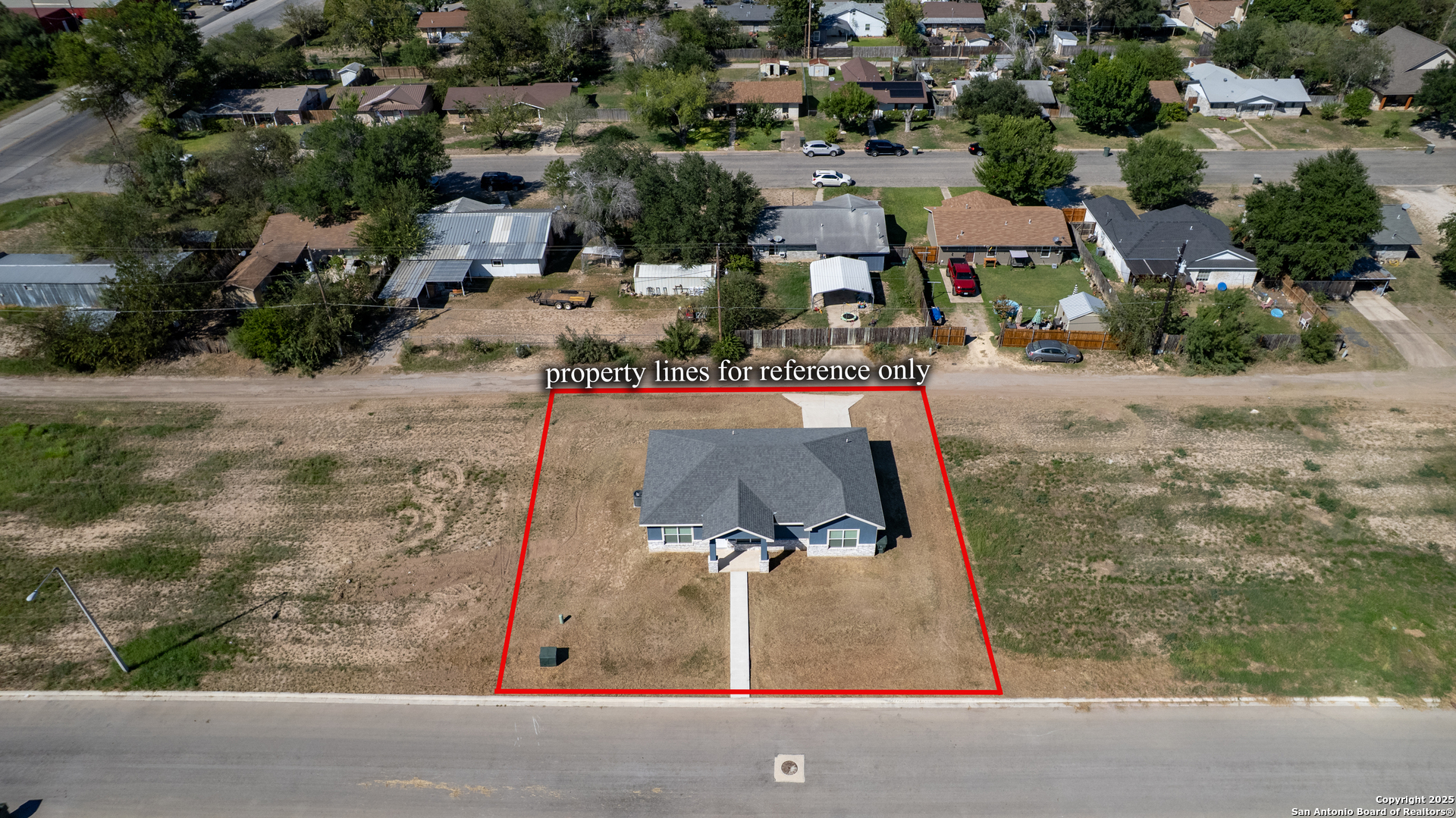 413 Guajillo Uvalde, TX 78801 - Photo 21 of 23 an aerial view of residential houses with outdoor space