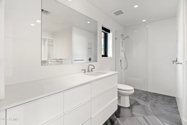 a view of an empty walk in closet