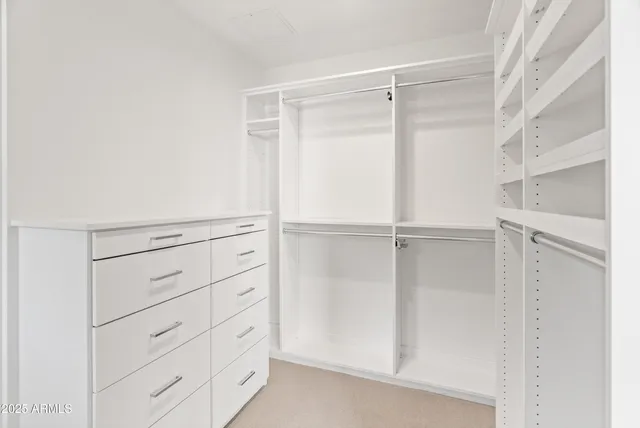 a view of swimming pool with seating area