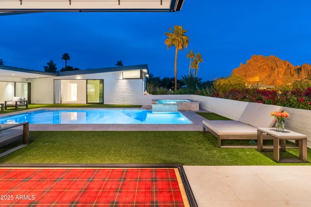 swimming pool with outdoor seating