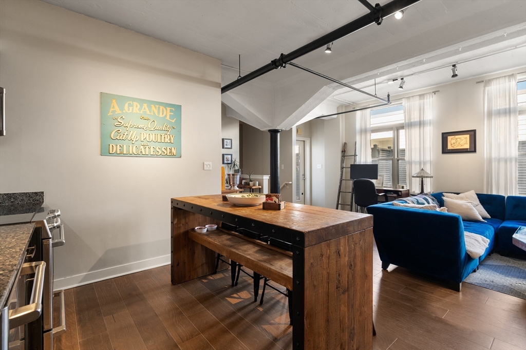 156-168 Terrace Street, Unit 402 Boston, MA 02120 - Photo 2 of 31 a view of a workspace with furniture