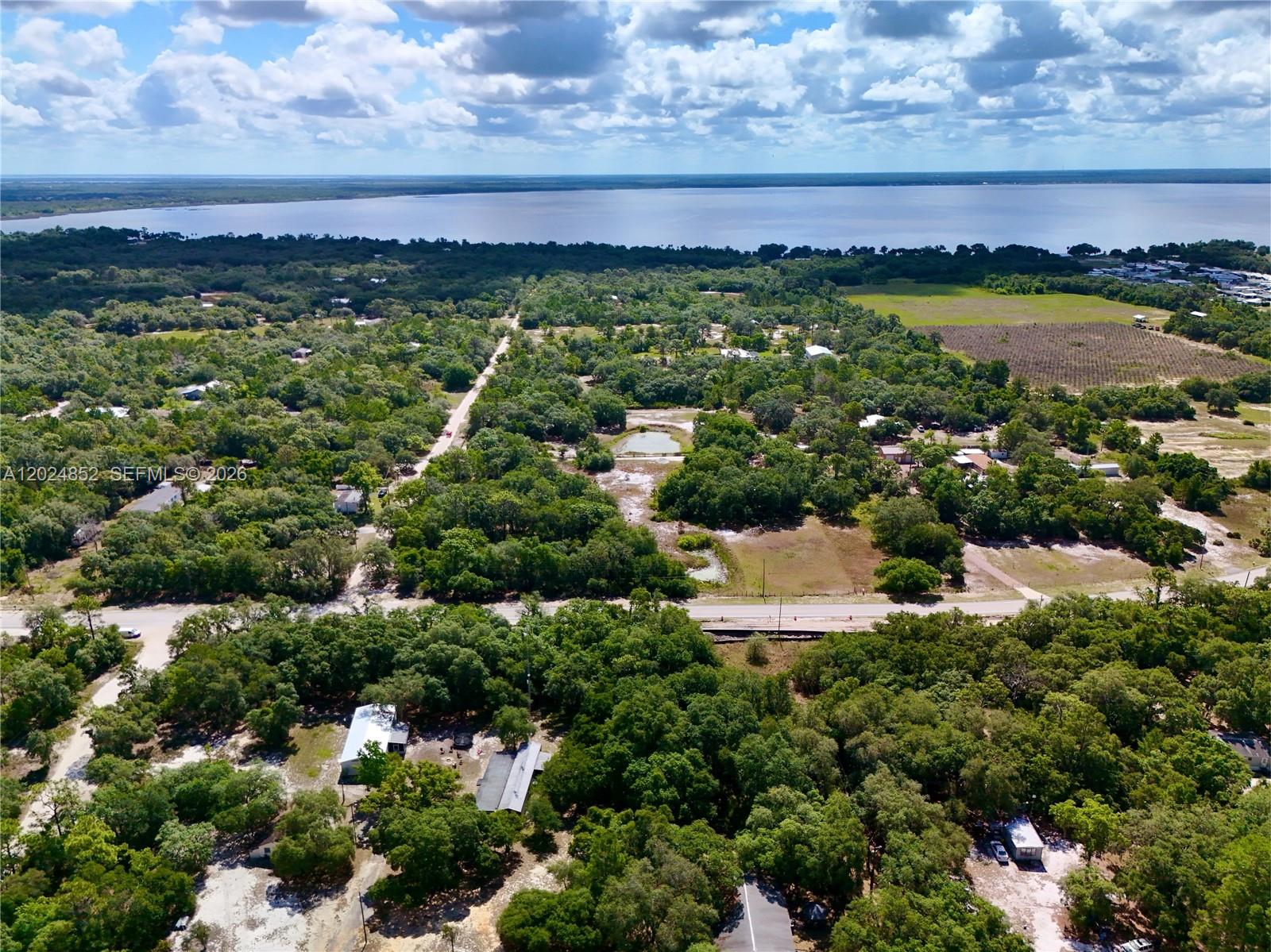 3175 Walk In Water Road Lake Wales, FL 33898 - Photo 20 of 35 a view of a lake with a city