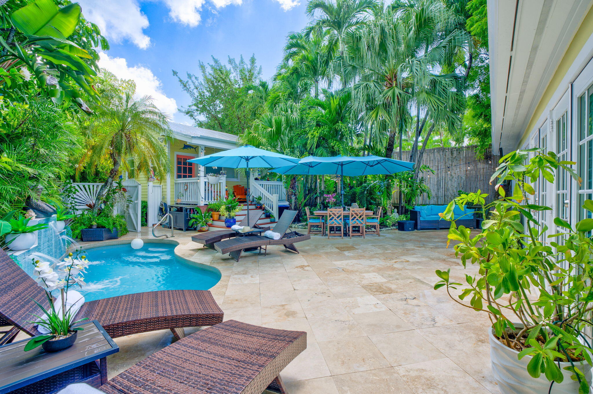 1501 White Street Key West, FL 33040 - Photo 2 of 49 a view of a backyard with sitting area and furniture