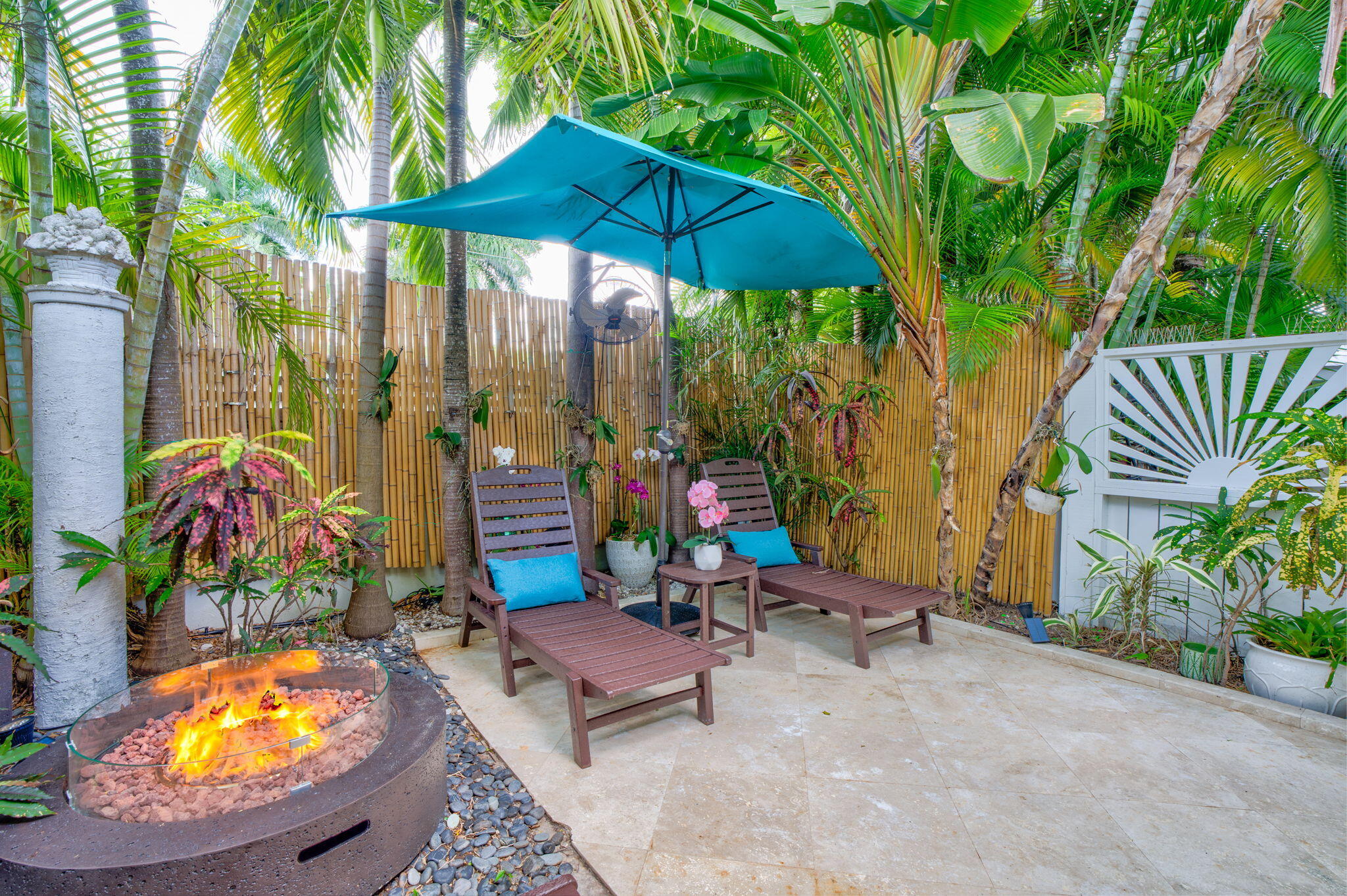 1501 White Street Key West, FL 33040 - Photo 38 of 49 a view of a chairs and table in backyard
