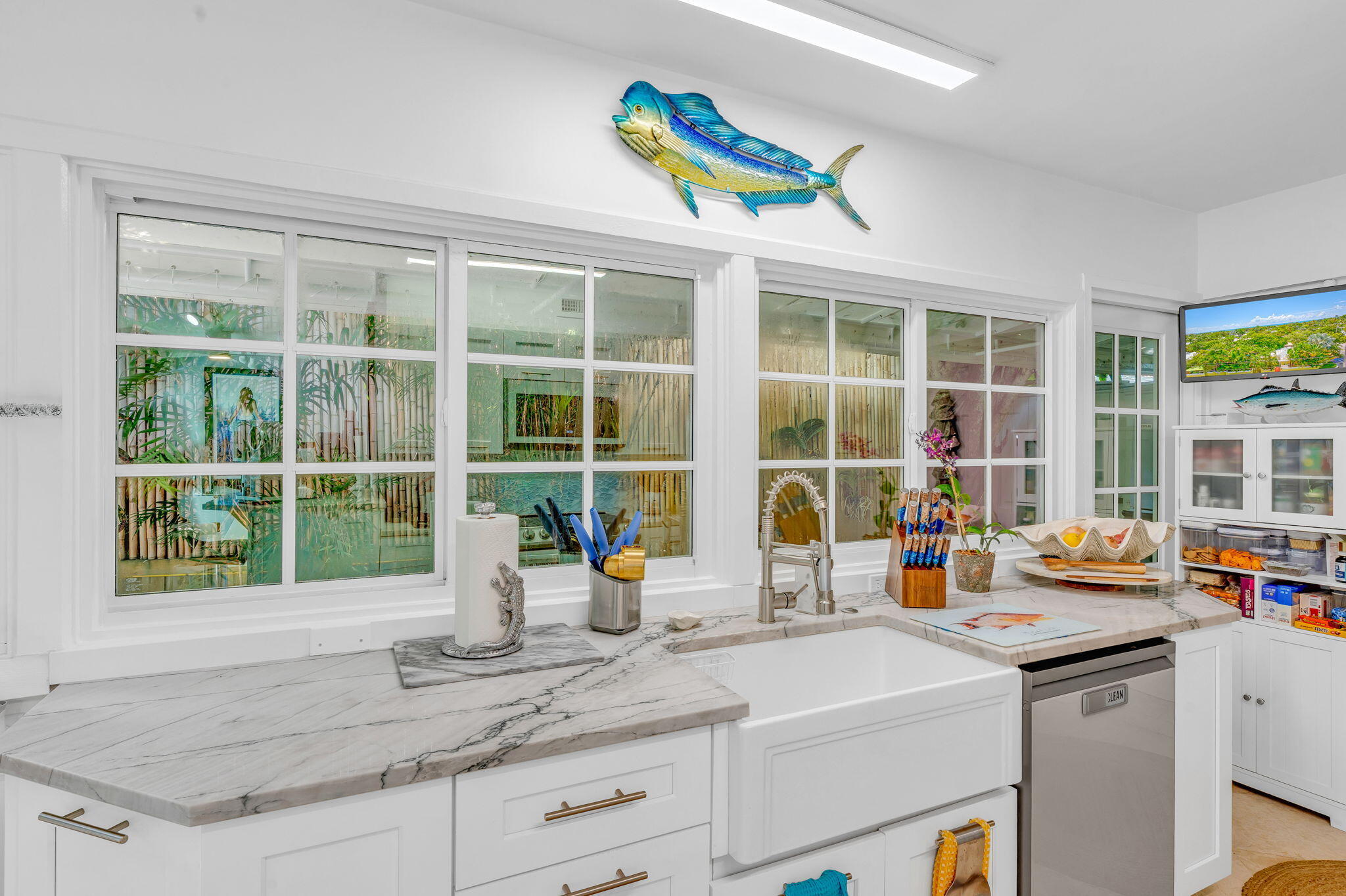 1501 White Street Key West, FL 33040 - Photo 7 of 49 a kitchen with a sink and a large window