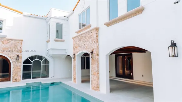 a view of a brick house with windows