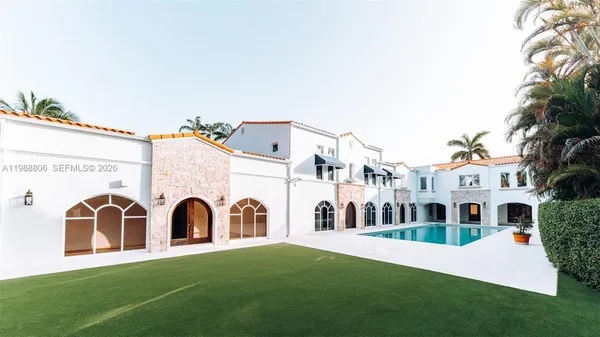 a view of swimming pool with a yard