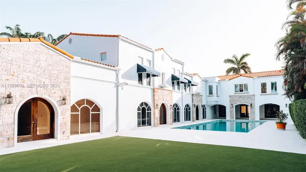 a view of swimming pool with a yard