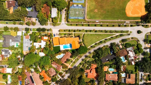 a view of a swimming pool with a garden